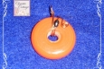 Orange wire wrapped pendant