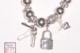 heart charm bracelet, key, lock