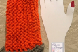 Orange and grey hand knit fingerless gloves