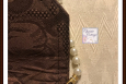 Pearl necklace on brown purse