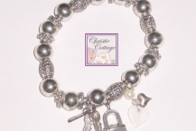 heart charm bracelet, key, lock